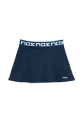 Load the image into the gallery view, Falda de pádel Nox Sport Team Azul 2026 con tablas laterales y cintura elástica. Diseño deportivo en azul marino que incluye short interior al tono para máxima cobertura y tejido técnico de alta transpirabilidad 
