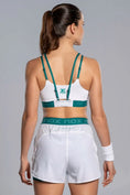 Load the image into the gallery view, Top Nox Mujer PRO combinado con short blanco- Look deportivo exclusivo disponible en Padel Storage 
