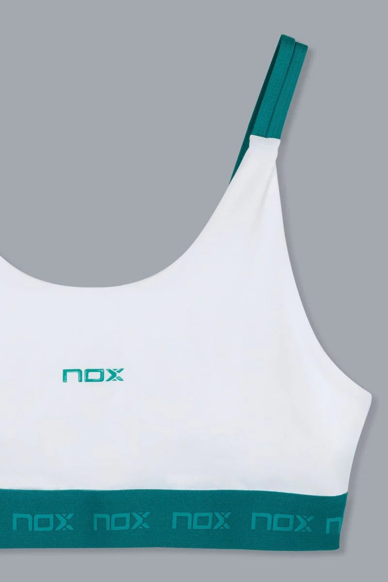 Banda elástica inferior con branding Nox en Verde Hiedra- Ajuste firme y diseño premium 